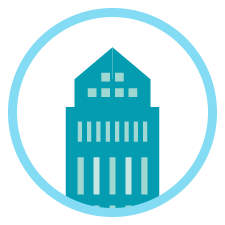 Blue circle icon containing skyscraper drawing